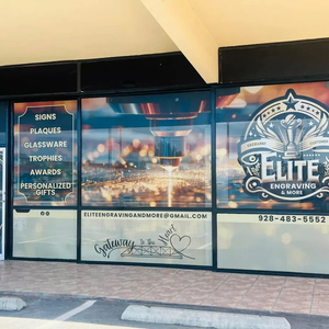 Storefront window perf graphics for an engraving shop
