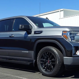 GMC Sierra pickup with a two-tone vinyl wrap